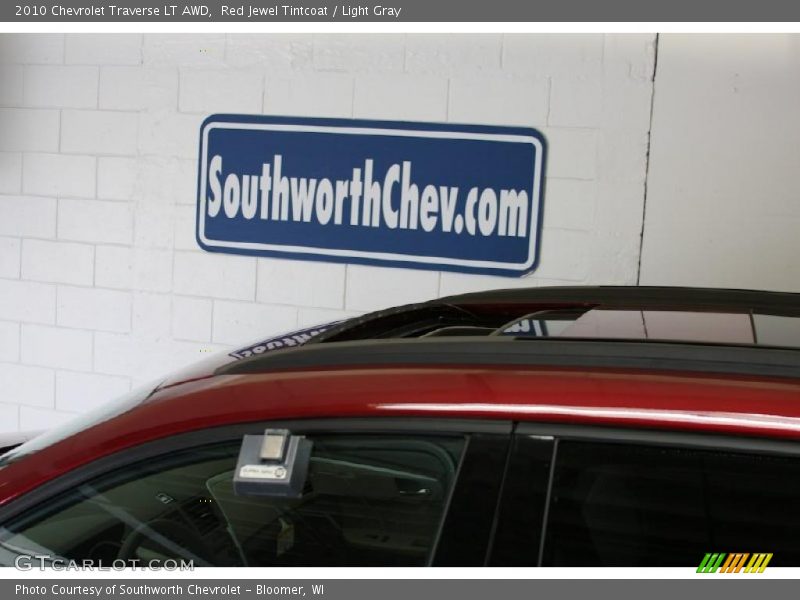 Red Jewel Tintcoat / Light Gray 2010 Chevrolet Traverse LT AWD