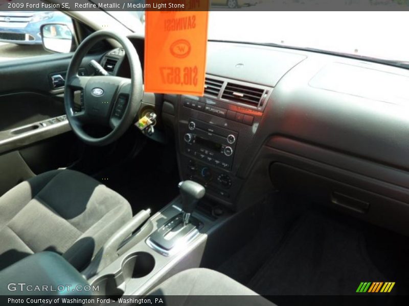 Redfire Metallic / Medium Light Stone 2009 Ford Fusion SE