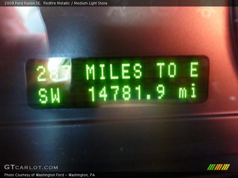 Redfire Metallic / Medium Light Stone 2009 Ford Fusion SE