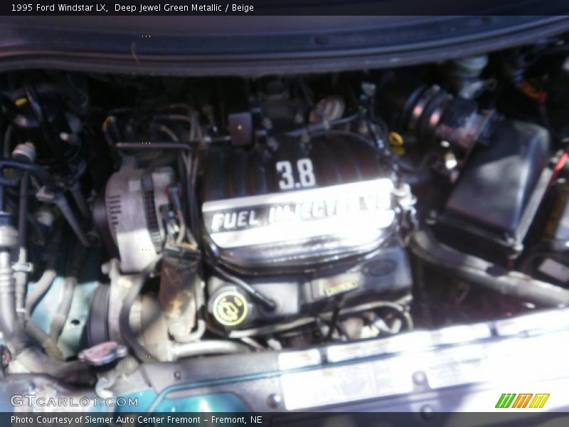 Deep Jewel Green Metallic / Beige 1995 Ford Windstar LX