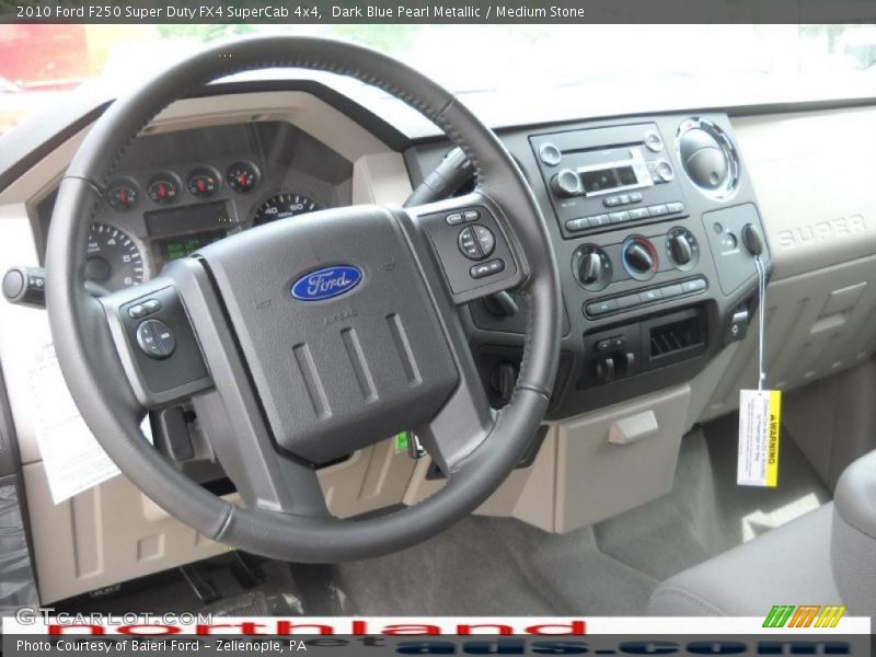 Dark Blue Pearl Metallic / Medium Stone 2010 Ford F250 Super Duty FX4 SuperCab 4x4