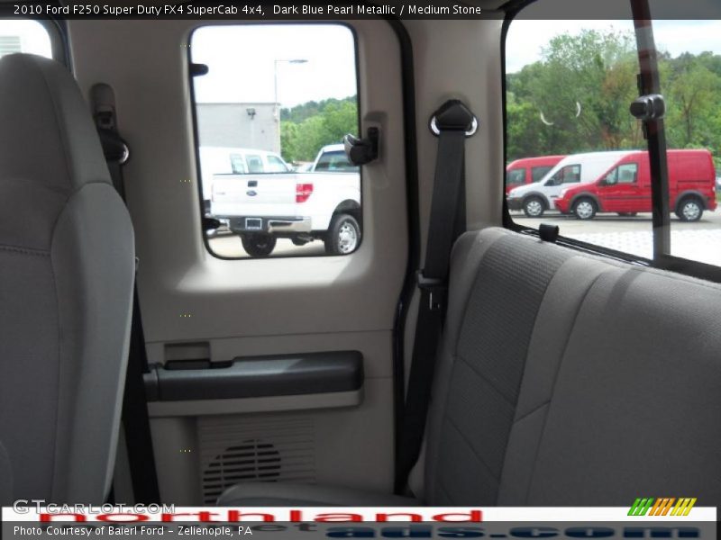 Dark Blue Pearl Metallic / Medium Stone 2010 Ford F250 Super Duty FX4 SuperCab 4x4