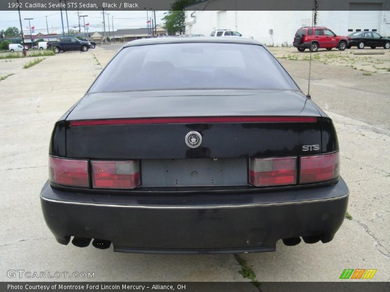 Black / Black 1992 Cadillac Seville STS Sedan