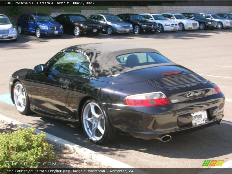 Black / Black 2002 Porsche 911 Carrera 4 Cabriolet