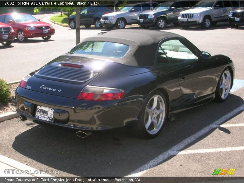 Black / Black 2002 Porsche 911 Carrera 4 Cabriolet