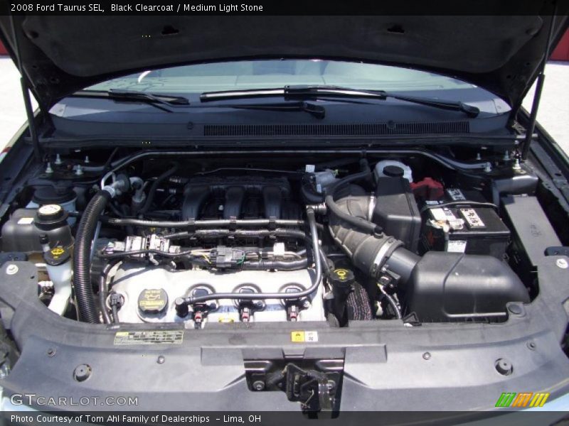 Black Clearcoat / Medium Light Stone 2008 Ford Taurus SEL