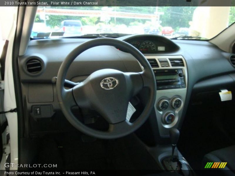Polar White / Dark Charcoal 2010 Toyota Yaris Sedan