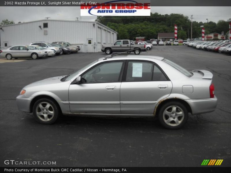 Sunlight Silver Metallic / Gray 2002 Mazda Protege LX