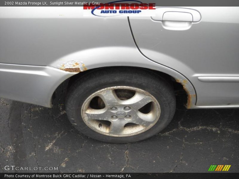 Sunlight Silver Metallic / Gray 2002 Mazda Protege LX