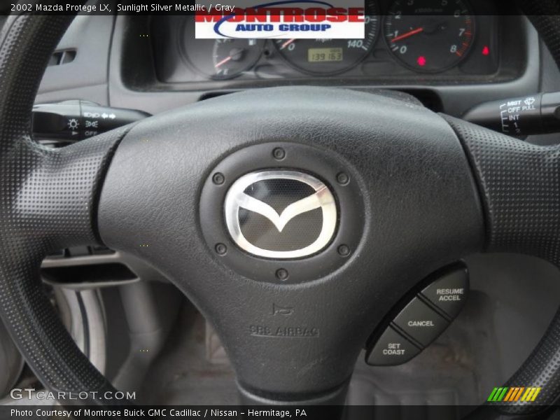 Sunlight Silver Metallic / Gray 2002 Mazda Protege LX
