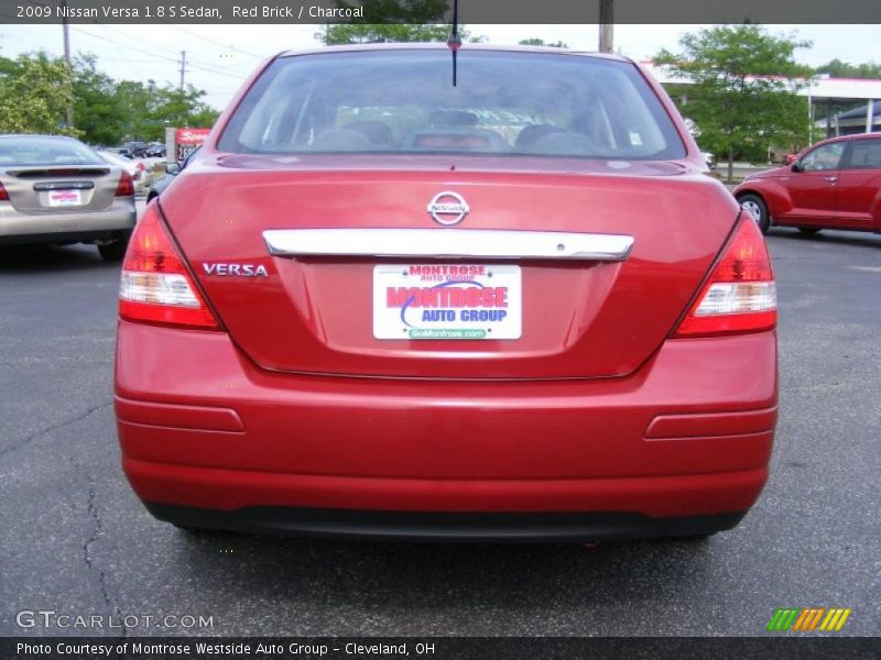Red Brick / Charcoal 2009 Nissan Versa 1.8 S Sedan