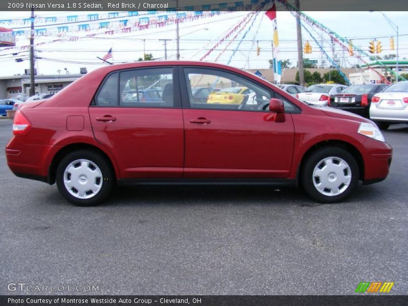 Red Brick / Charcoal 2009 Nissan Versa 1.8 S Sedan