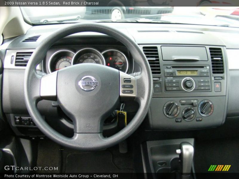 Red Brick / Charcoal 2009 Nissan Versa 1.8 S Sedan