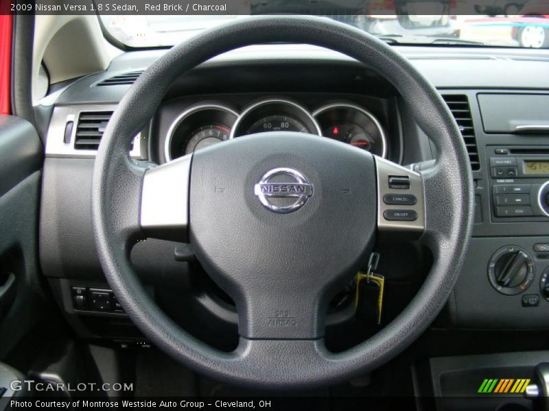 Red Brick / Charcoal 2009 Nissan Versa 1.8 S Sedan