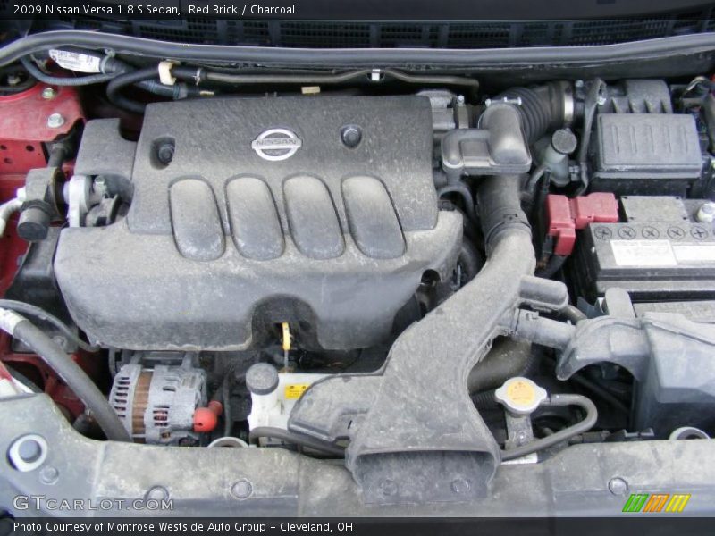 Red Brick / Charcoal 2009 Nissan Versa 1.8 S Sedan