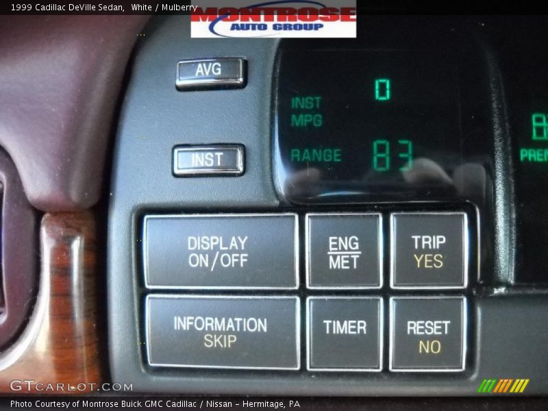 White / Mulberry 1999 Cadillac DeVille Sedan