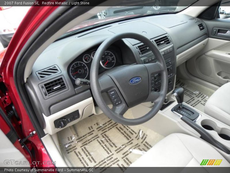 Redfire Metallic / Light Stone 2007 Ford Fusion SE