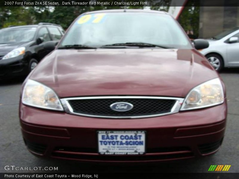 Dark Toreador Red Metallic / Charcoal/Light Flint 2007 Ford Focus ZX4 SE Sedan