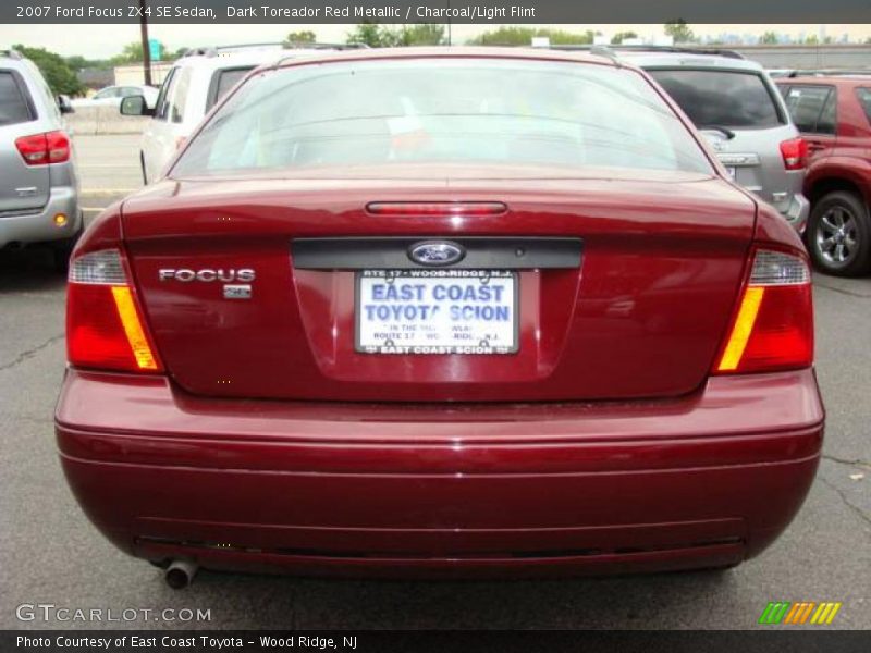 Dark Toreador Red Metallic / Charcoal/Light Flint 2007 Ford Focus ZX4 SE Sedan