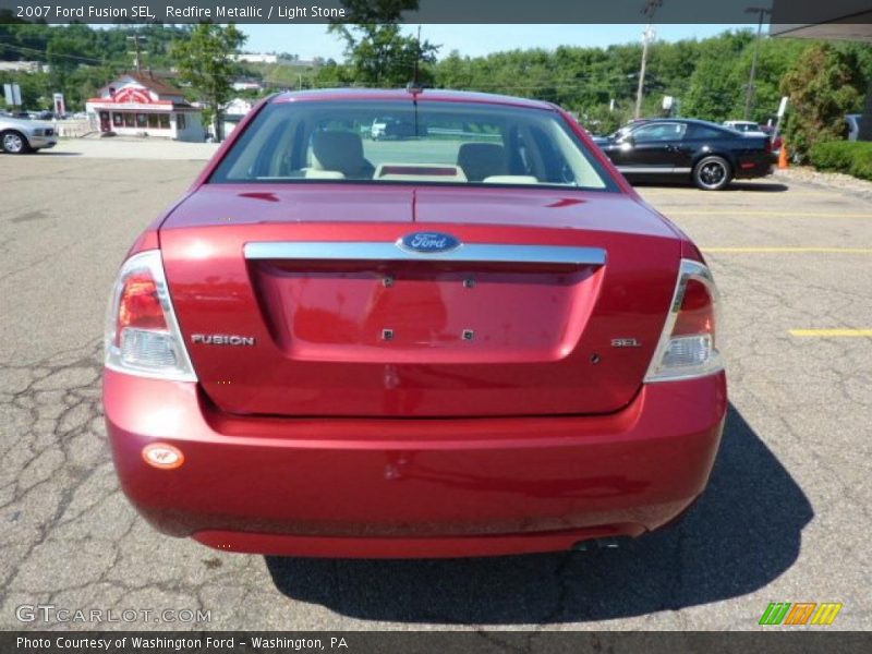 Redfire Metallic / Light Stone 2007 Ford Fusion SEL