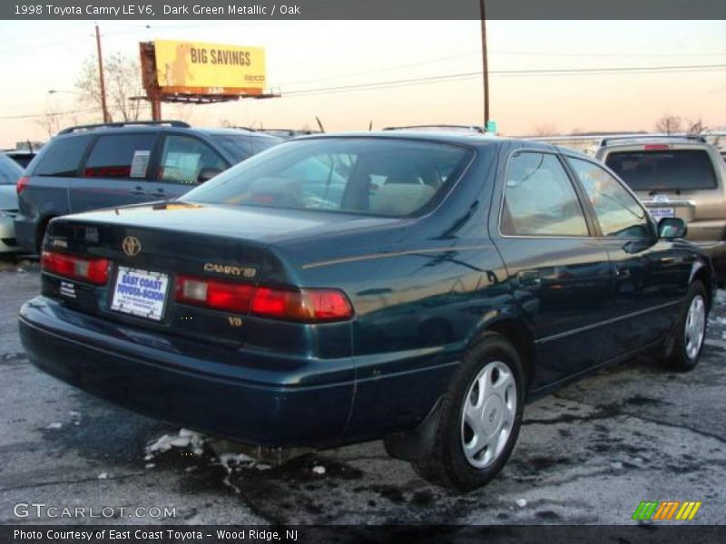 Dark Green Metallic / Oak 1998 Toyota Camry LE V6