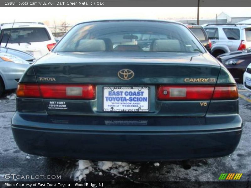 Dark Green Metallic / Oak 1998 Toyota Camry LE V6