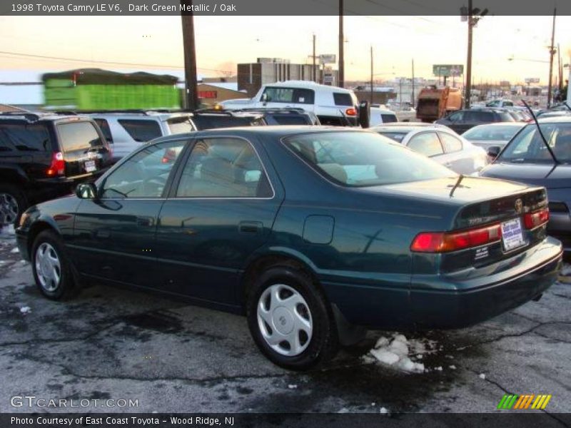 Dark Green Metallic / Oak 1998 Toyota Camry LE V6