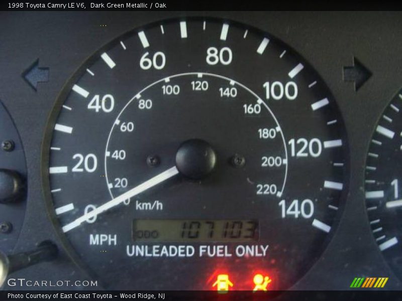 Dark Green Metallic / Oak 1998 Toyota Camry LE V6