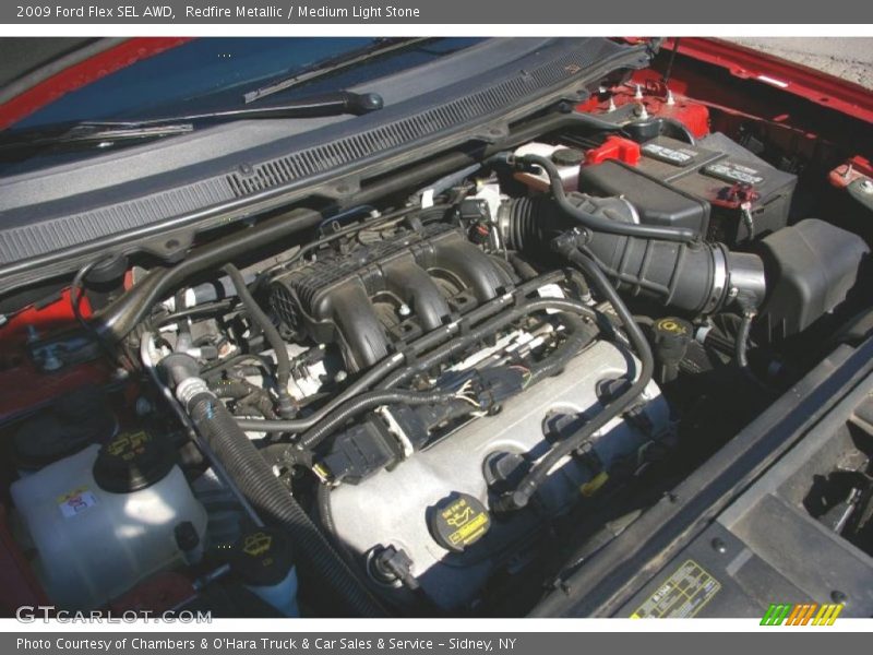 Redfire Metallic / Medium Light Stone 2009 Ford Flex SEL AWD