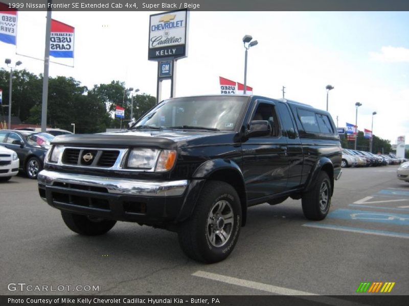 Super Black / Beige 1999 Nissan Frontier SE Extended Cab 4x4
