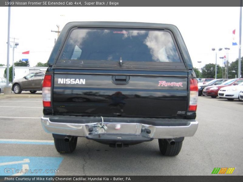 Super Black / Beige 1999 Nissan Frontier SE Extended Cab 4x4