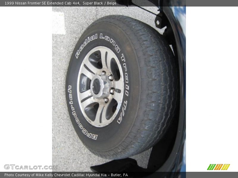 Super Black / Beige 1999 Nissan Frontier SE Extended Cab 4x4