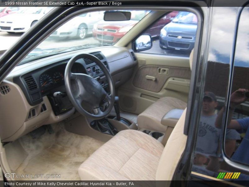 Super Black / Beige 1999 Nissan Frontier SE Extended Cab 4x4