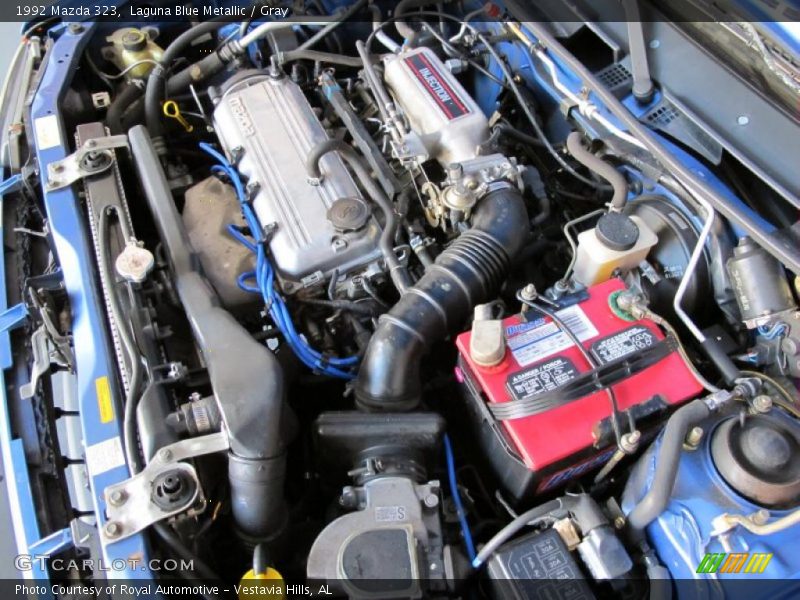 Laguna Blue Metallic / Gray 1992 Mazda 323
