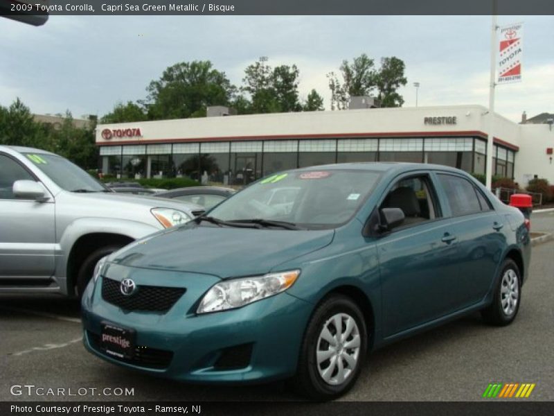 Capri Sea Green Metallic / Bisque 2009 Toyota Corolla