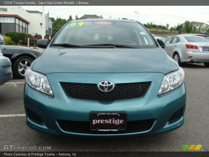 Capri Sea Green Metallic / Bisque 2009 Toyota Corolla
