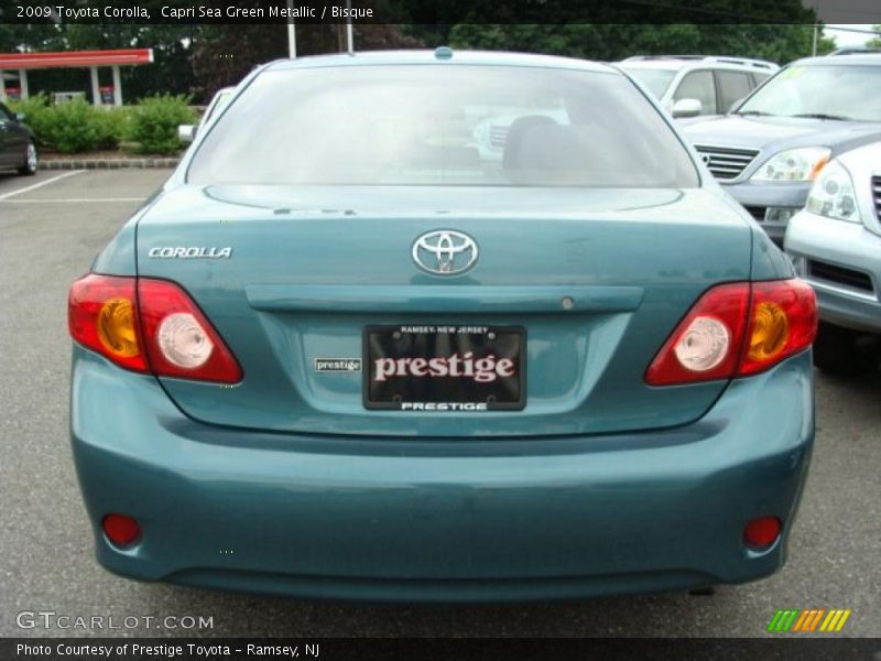 Capri Sea Green Metallic / Bisque 2009 Toyota Corolla