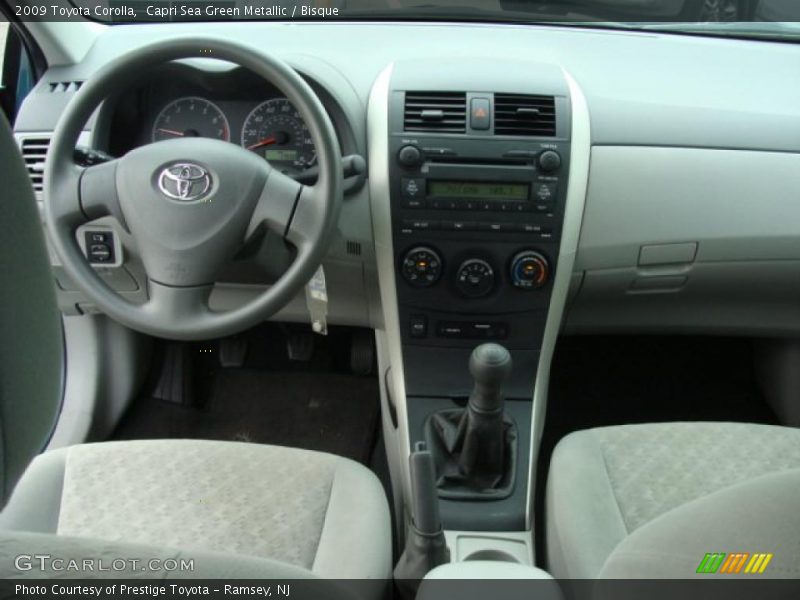 Capri Sea Green Metallic / Bisque 2009 Toyota Corolla