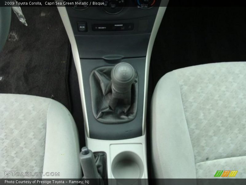 Capri Sea Green Metallic / Bisque 2009 Toyota Corolla