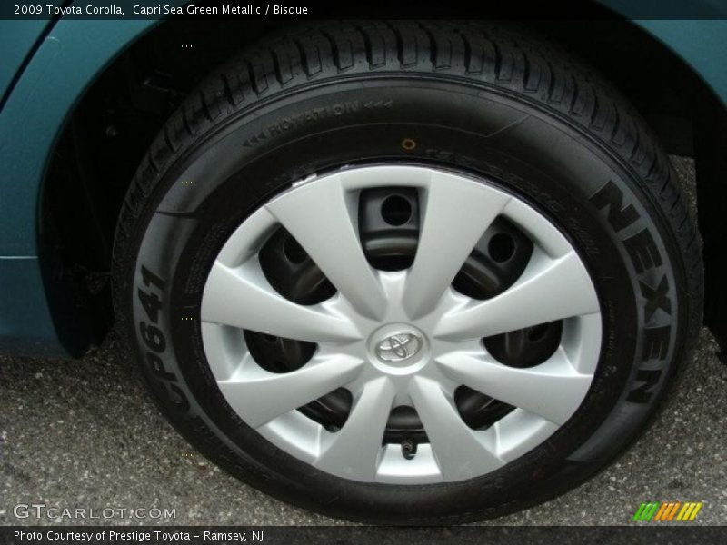 Capri Sea Green Metallic / Bisque 2009 Toyota Corolla