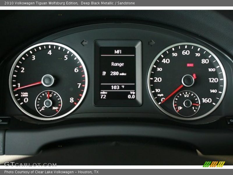 Deep Black Metallic / Sandstone 2010 Volkswagen Tiguan Wolfsburg Edition