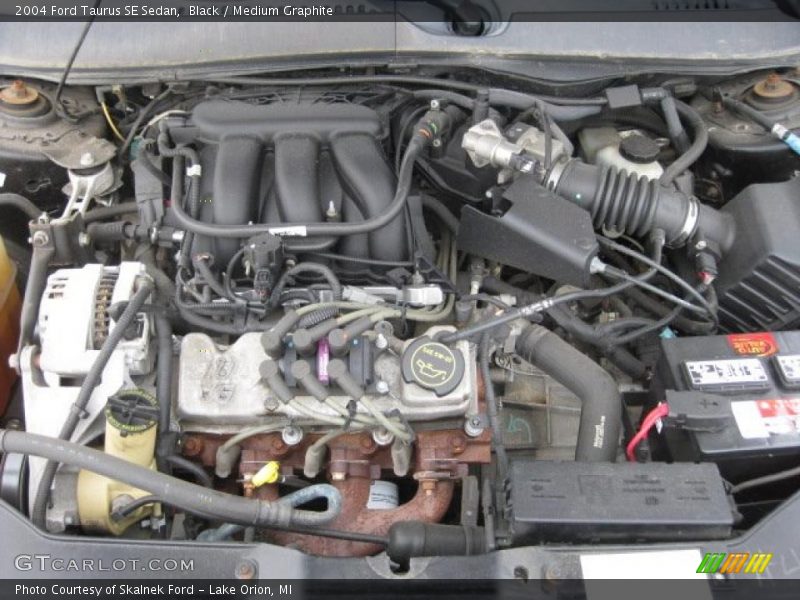 Black / Medium Graphite 2004 Ford Taurus SE Sedan