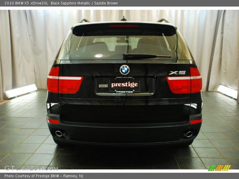 Black Sapphire Metallic / Saddle Brown 2010 BMW X5 xDrive30i