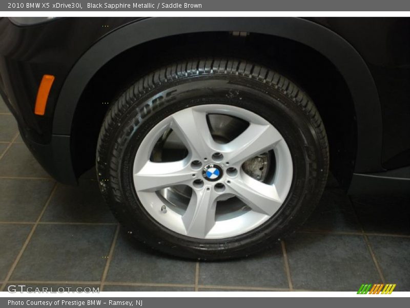 Black Sapphire Metallic / Saddle Brown 2010 BMW X5 xDrive30i