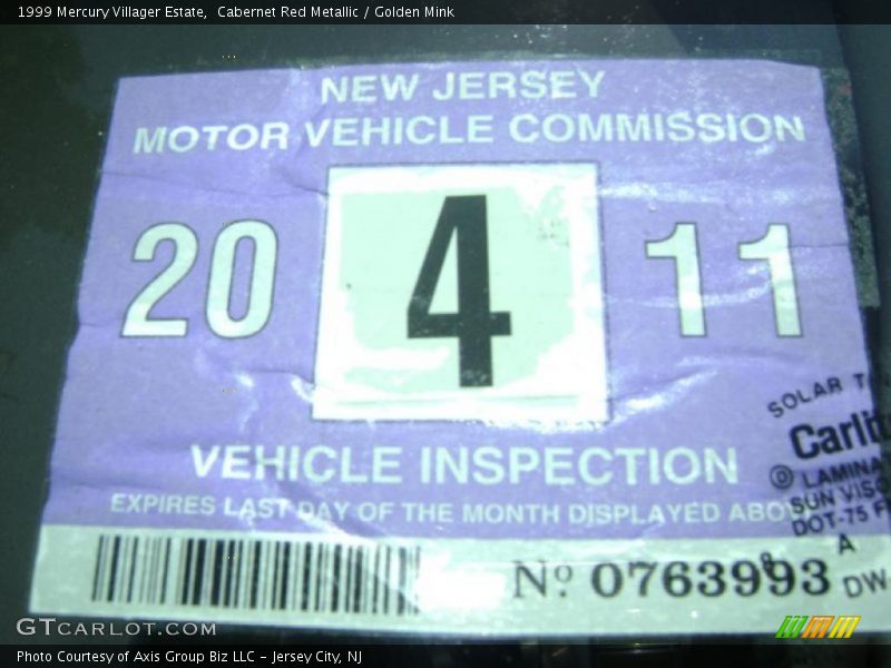 Cabernet Red Metallic / Golden Mink 1999 Mercury Villager Estate