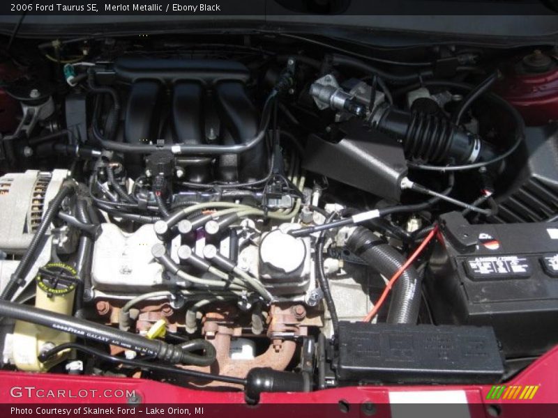 Merlot Metallic / Ebony Black 2006 Ford Taurus SE