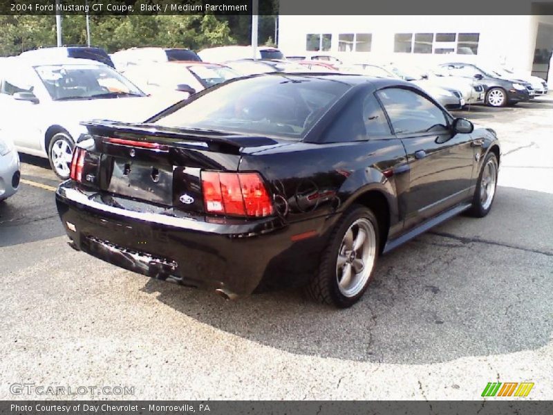 Black / Medium Parchment 2004 Ford Mustang GT Coupe
