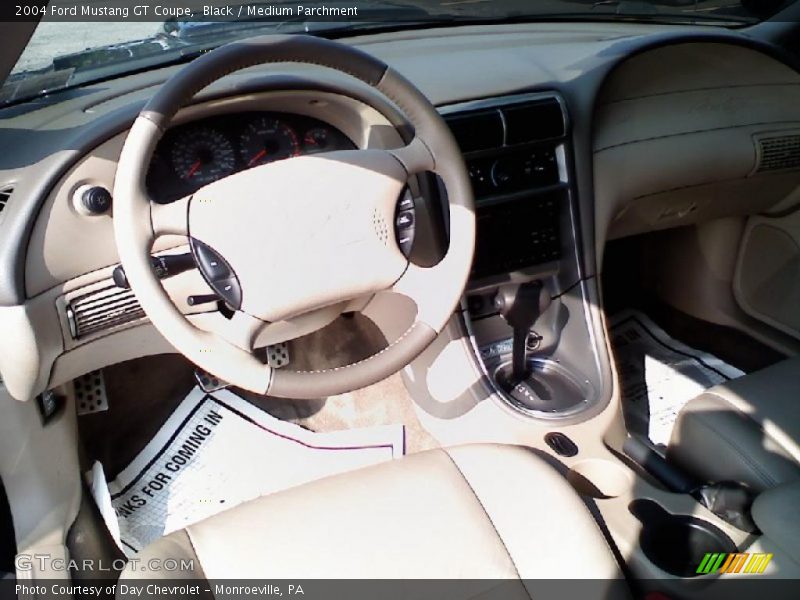 Black / Medium Parchment 2004 Ford Mustang GT Coupe
