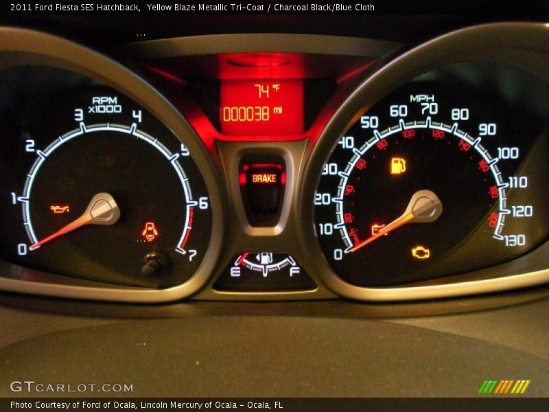 Yellow Blaze Metallic Tri-Coat / Charcoal Black/Blue Cloth 2011 Ford Fiesta SES Hatchback