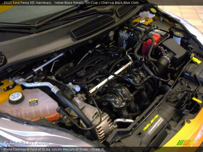 Yellow Blaze Metallic Tri-Coat / Charcoal Black/Blue Cloth 2011 Ford Fiesta SES Hatchback